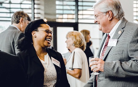 East Mississippi Community College Associate Dean of Instruction William Sansing, at right, chats with Woodward Hines Education Foundation Program Officer Shanell Watson during the Women of Vision 2018 event in Jackson where EMCC was awarded a $20,000 grant by the Women’s Foundation of Mississippi. East Mississippi Community College Associate Dean of Instruction William Sansing, at right, chats with Woodward Hines Education Foundation Program Officer Shanell Watson during the Women of Vision 2018 event in Jackson where EMCC was awarded a $20,000 grant by the Women’s Foundation of Mississippi.