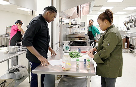 East Mississippi Community College Culinary Arts students Zavier Minor, at left, and Brittany Jackson, at right, prepare a dish during class. They are among a group of EMCC students who will present “Taste of Italy,” a four-course dinner at the EMCC Lion Hills Center. East Mississippi Community College Culinary Arts students Zavier Minor, at left, and Brittany Jackson, at right, prepare a dish during class. They are among a group of EMCC students who will present “Taste of Italy,” a four-course dinner at the EMCC Lion Hills Center.